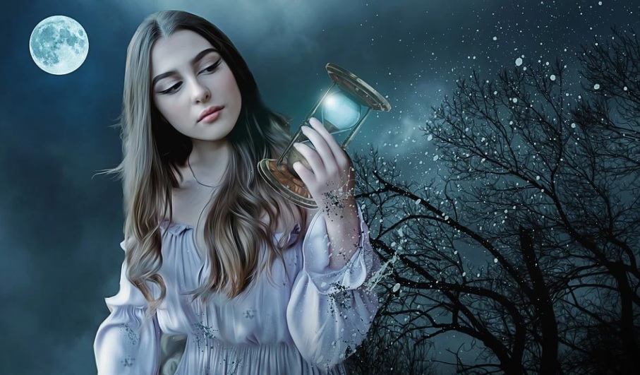 Girl with hourglass under moon light